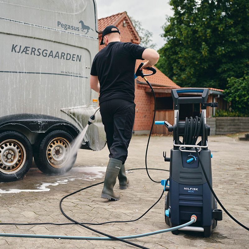 Nilfisk MC 2C 120520 XT AU Compact Cold Water Electric Pressure Water Being Used on Caravan