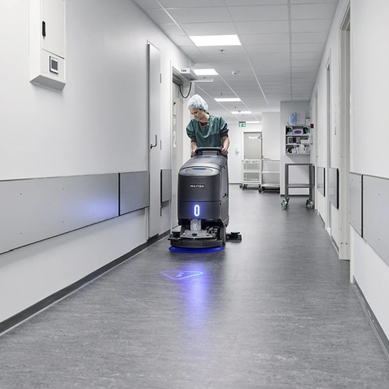 Nilfisk SC550 Mid Sized Walk Behind Scrubber Dryer In Hospital