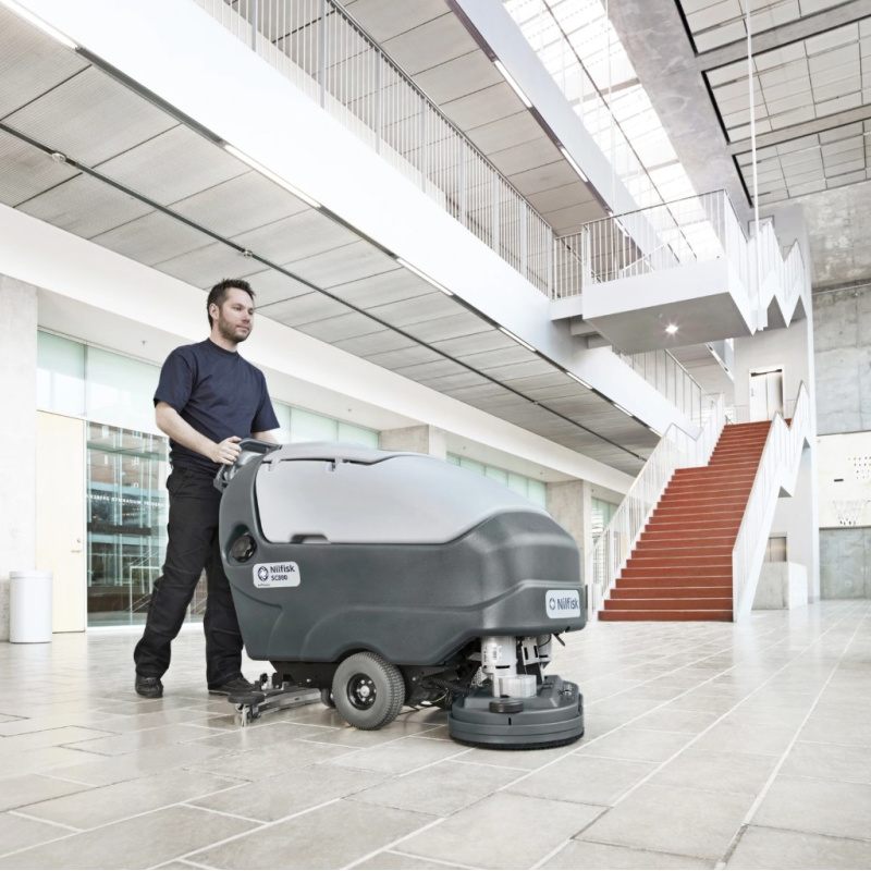 Nilfisk SC800 Large Walk Behind Scrubber Dryer Action In Office