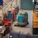 Tennant T12 Compact Ride-On Floor Scrubber Action