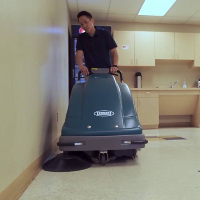 Tennant S7 Walk Behind Battery Sweeper Front View In Use